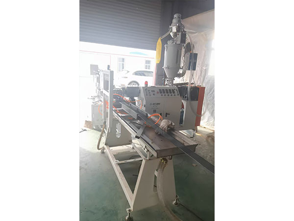 金剛網(wǎng)包邊擠出機