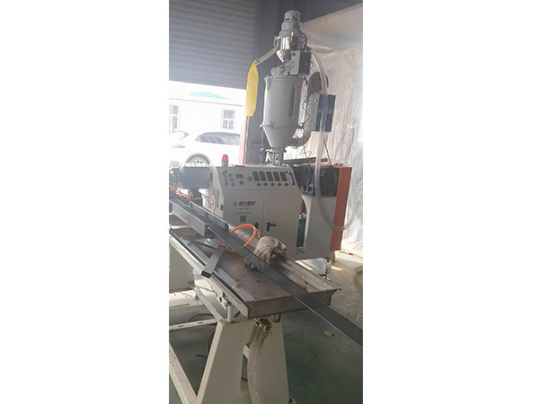 金剛網(wǎng)包邊擠出機